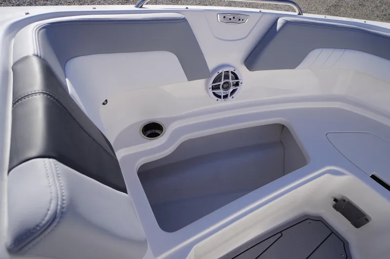 Slide: The Image of 2026 Chaparral 23 SSi OB boat interior with seating and speaker detail. - 14