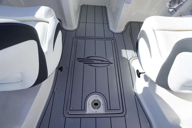 Slide: The Image of 2026 Chaparral 23 SSi OB boat interior with sleek seating and stylish flooring design. - 38