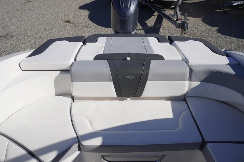 Slide: The Image of 2026 Chaparral 23 SSi OB boat interior with sleek, modern seating design. - 56