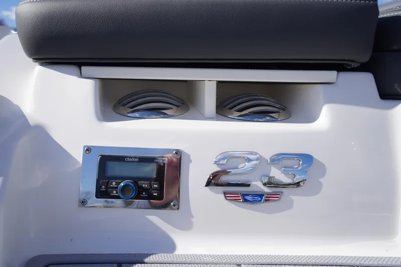 Slide: The Image of 2026 Chaparral 23 SSi OB boat dashboard with Clarion stereo system. - 61