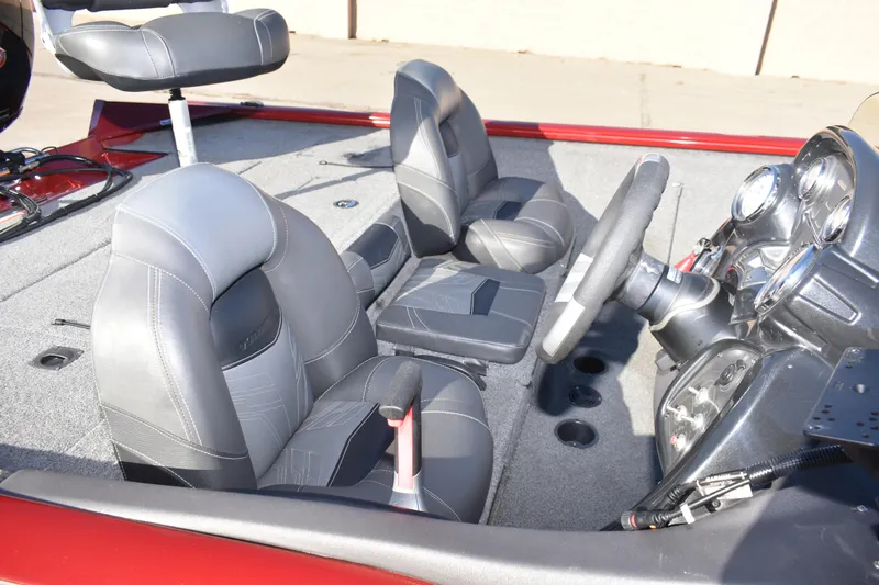 Slide: The Image of 2019 Tracker Pro Team 195 TXW Tournament Edition boat interior with steering wheel and seats. - 12