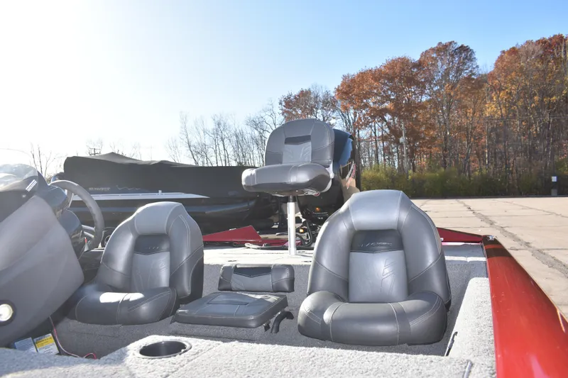 Slide: The Image of 2019 Tracker Pro Team 195 TXW Tournament Edition boat interior with gray seating. - 17