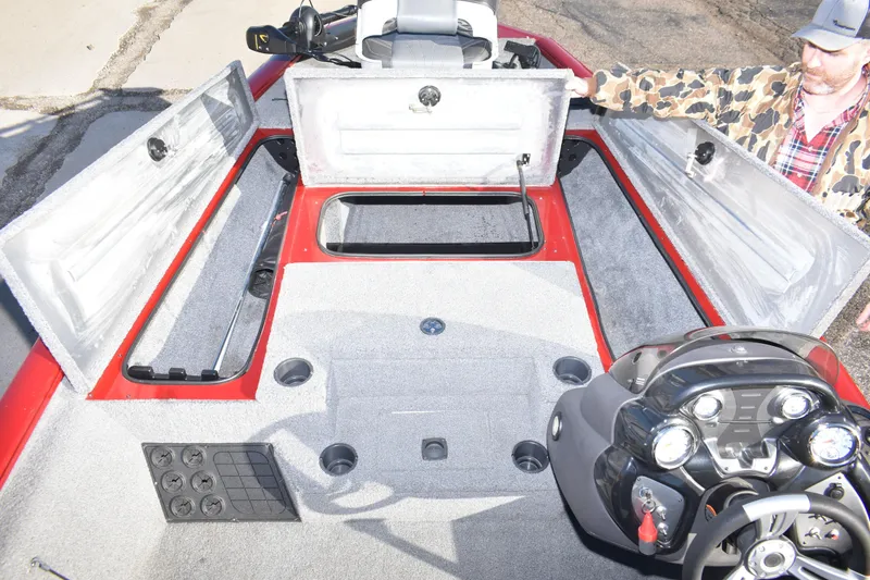 Slide: The Image of 2019 Tracker Pro Team 195 TXW Tournament Edition boat interior with open storage compartments. - 21