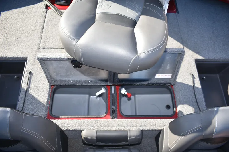 Slide: The Image of 2019 Tracker Pro Team 195 TXW Tournament Edition boat interior with seating and storage compartments. - 24