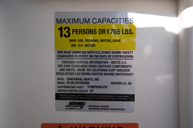 Slide: The Image of 2026 Chaparral 23 SSi OB capacity label: 13 persons, 1765 lbs, 250 HP motor. - 31