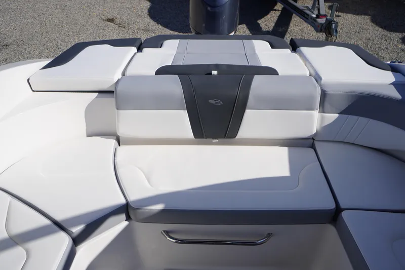 Slide: The Image of 2026 Chaparral 23 SSi OB boat interior with cushioned seating and sleek design. - 42