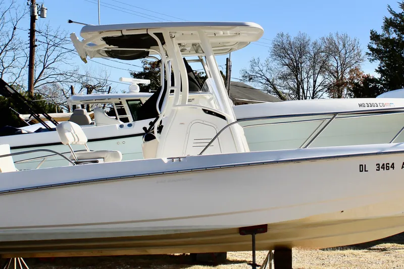 Slide: The Image of 2020 Boston Whaler 240 Dauntless boat on display, showcasing sleek design and modern features. - 3