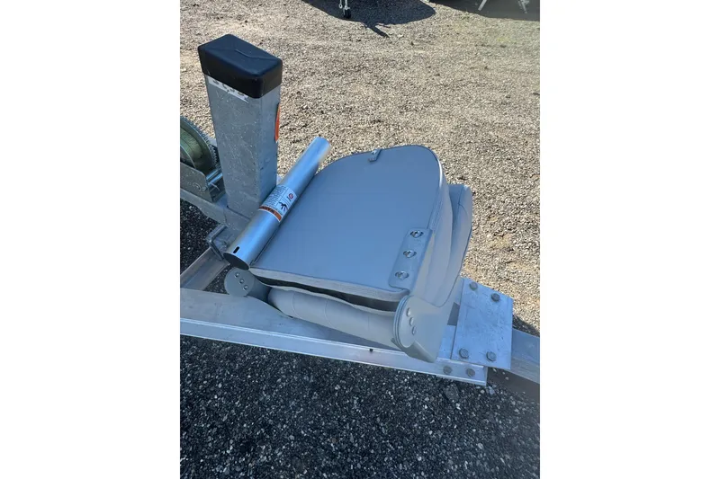 Slide: The Image of Trailer hitch of 2020 Hurricane SunDeck Sport 192 RL OB boat on gravel surface. - 12