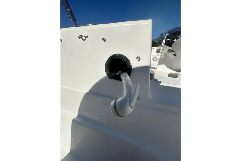 Slide: The Image of 2020 Hurricane SunDeck Sport 192 RL OB boat interior detail with white seating and fixtures. - 13