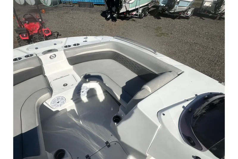 Slide: The Image of 2020 Hurricane SunDeck Sport 192 RL OB boat interior with spacious seating and cup holders. - 15
