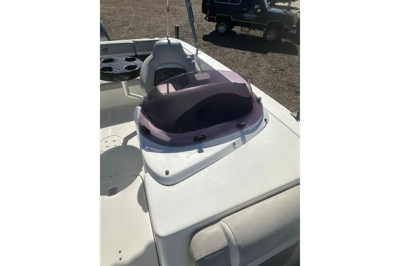 Slide: The Image of 2020 Hurricane SunDeck Sport 192 RL OB boat interior with seating and console. - 20