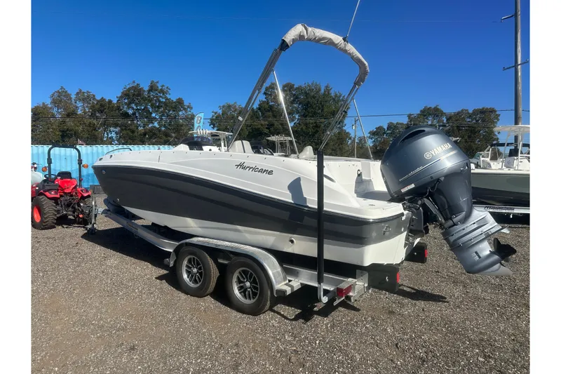 Slide: The Image of 2020 Hurricane SunDeck Sport 192 RL OB boat on trailer, featuring Yamaha outboard motor. - 3