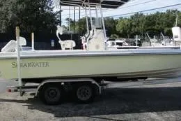 The Image of 2006 Shearwater Boatworks Z2400 on trailer, side view, outdoors. - 1