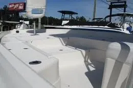 Slide: The Image of 2006 Shearwater Boatworks Z2400, white deck, outdoor setting, clear sky. - 4