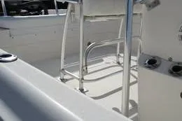 Slide: The Image of 2006 Shearwater Boatworks Z2400 interior with metal framework and seating area. - 6