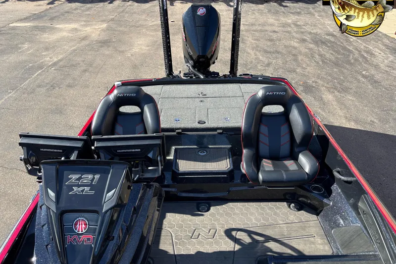 Slide: The Image of 2024 Nitro Z21 XL boat interior with dual seats and advanced navigation systems. - 10