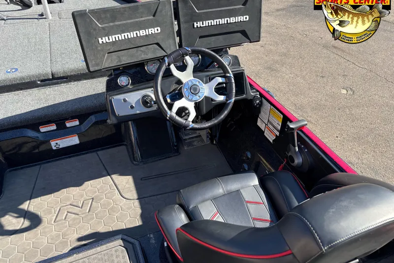 Slide: The Image of 2024 Nitro Z21 XL boat cockpit with dual Humminbird displays and steering wheel. - 7