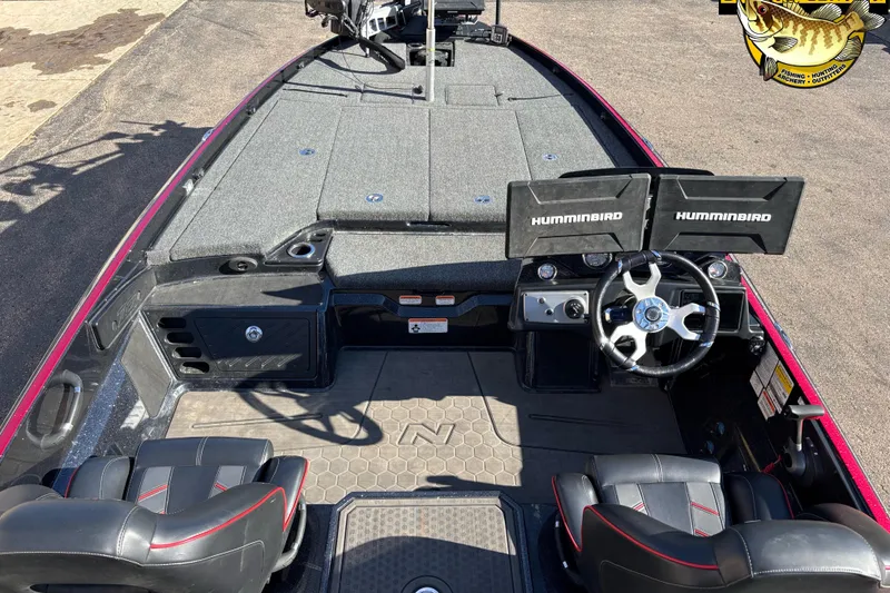 Slide: The Image of 2024 Nitro Z21 XL boat interior with dual Humminbird displays and steering wheel. - 8