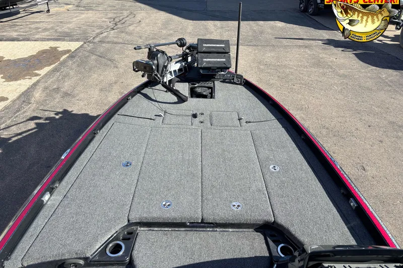 Slide: The Image of 2024 Nitro Z21 XL boat deck with fishing equipment and storage compartments. - 9