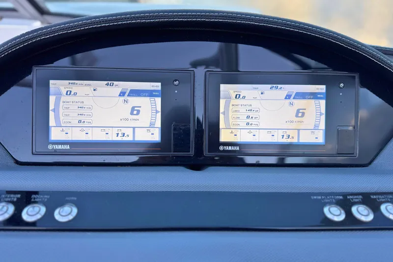 Slide: The Image of Dashboard of a 2019 Cobalt 25SC boat with Yamaha digital displays. - 23