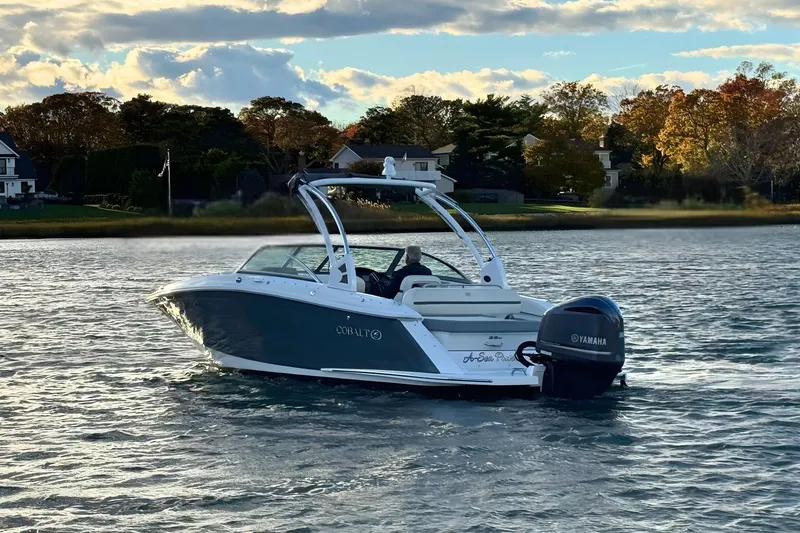 Slide: The Image of 2019 Cobalt 25SC boat on water with Yamaha outboard, scenic background. - 4
