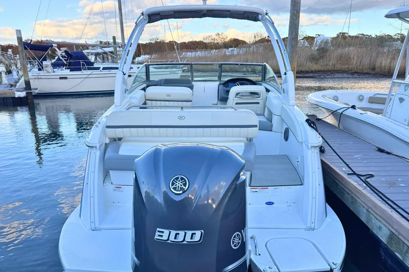 Slide: The Image of 2019 Cobalt 25SC boat with Yamaha 300 engine docked at marina. - 9