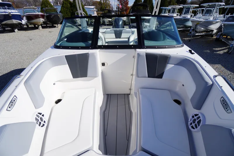 Slide: The Image of 2026 Chaparral 23 SSi OB boat interior with spacious seating and modern design. - 16
