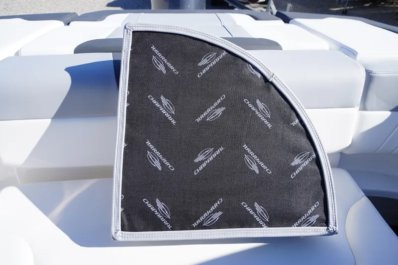 Slide: The Image of 2026 Chaparral 23 SSi OB boat seat with branded cover, showcasing luxury design. - 52