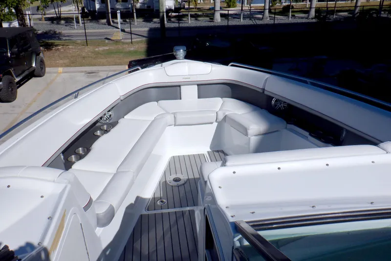 Slide: The Image of Storage compartment with life jackets and lifebuoys on a 2015 Formula 350 Crossover Bowrider. - 15