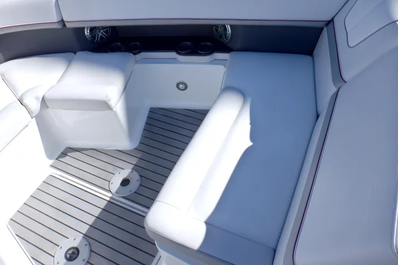 Slide: The Image of 2015 Formula 350 Crossover Bowrider boat interior with white seating and sleek design. - 17