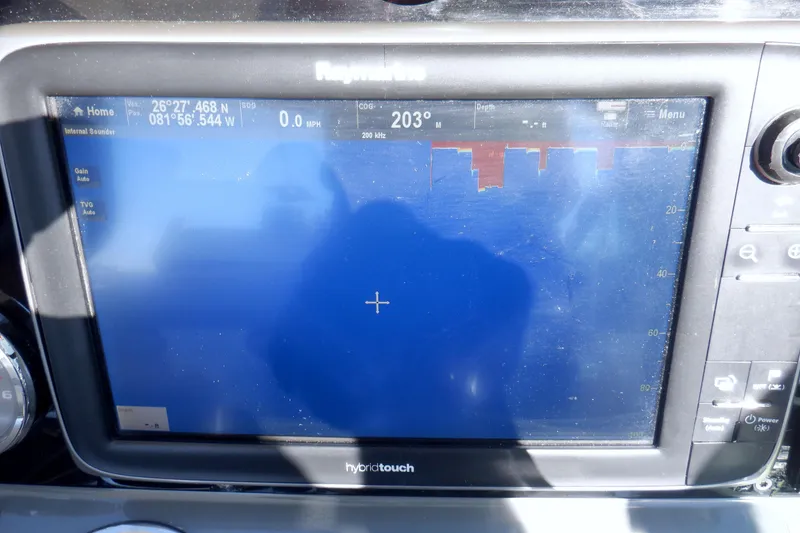 Slide: The Image of Dashboard of a 2015 Formula 350 Crossover Bowrider with gauges and navigation screen. - 20