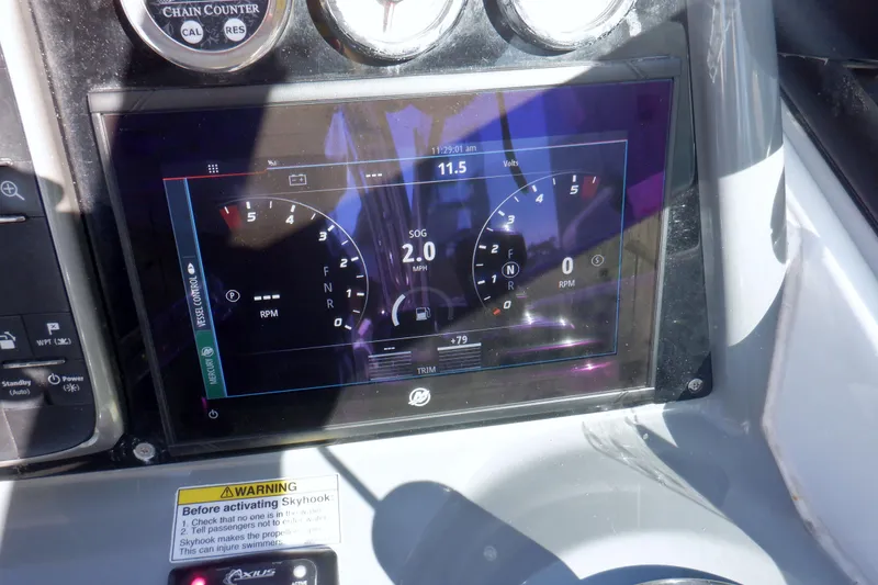Slide: The Image of Raymarine HybridTouch display on 2015 Formula 350 Crossover Bowrider showing navigation data. - 21