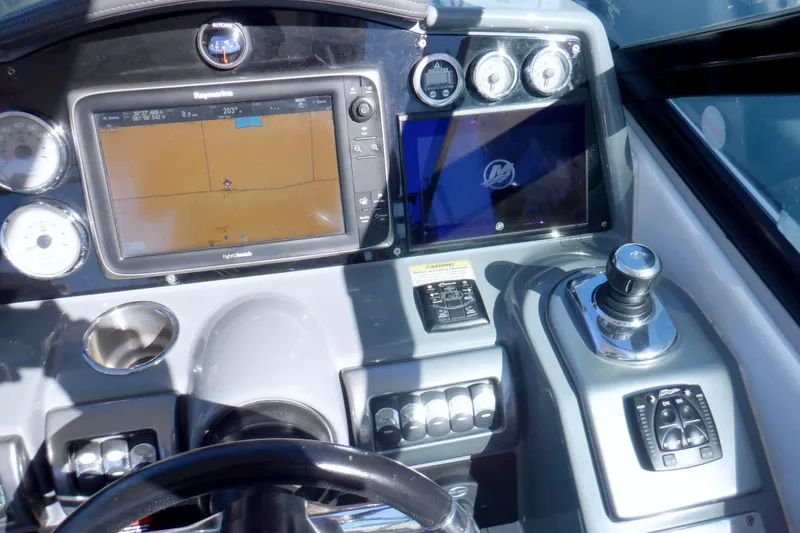 Slide: The Image of Dashboard of 2015 Formula 350 Crossover Bowrider with digital display and controls. - 22