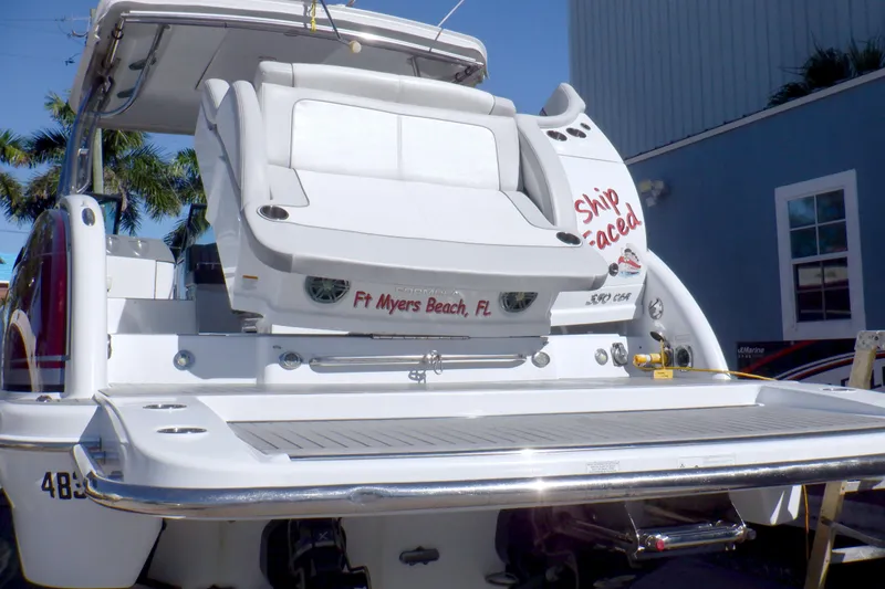 Slide: The Image of 2015 Formula 350 Crossover Bowrider boat with radar equipment against clear blue sky. - 4