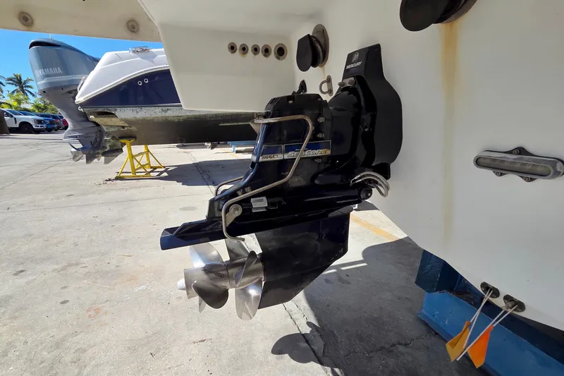 Slide: The Image of 2015 Formula 350 Crossover Bowrider with Mercury Bravo engine, docked on a sunny day. - 58