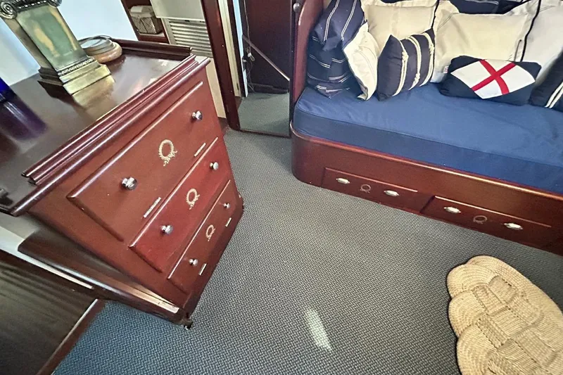 Slide: The Image of Luxurious 1930 Classic 47' ACF yacht interior with elegant wood furniture and nautical decor. - 11