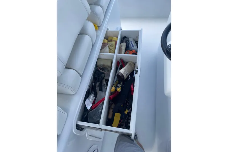 Slide: The Image of Storage drawer with tools and supplies on 2023 Conch 41 Center Console boat. - 22