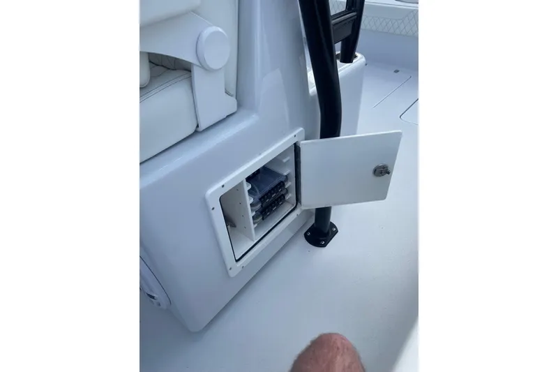 Slide: The Image of Open storage compartment on 2023 Conch 41 Center Console boat. - 24