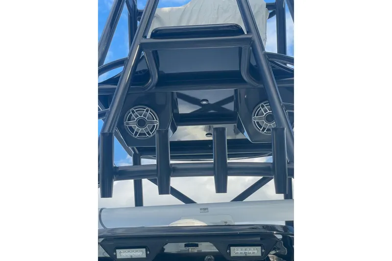 Slide: The Image of 2023 Conch 41 Center Console boat with speakers and sturdy framework. - 29