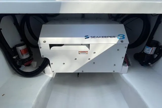 Slide: The Image of Seakeeper 3 stabilizer in 2023 Conch 41 Center Console boat interior. - 33