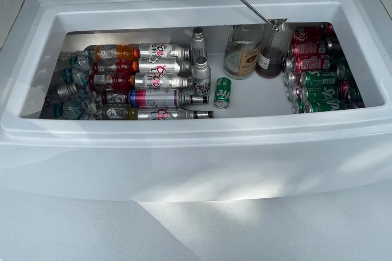 Slide: The Image of Cooler stocked with drinks on 2023 Conch 41 Center Console boat. - 34