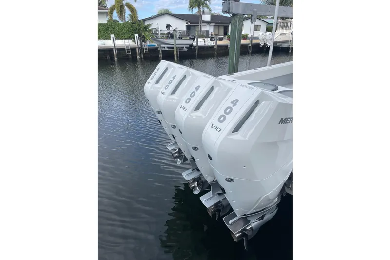 Slide: The Image of Four Mercury 400 V10 outboard engines on a 2023 Conch 41 Center Console boat. - 38