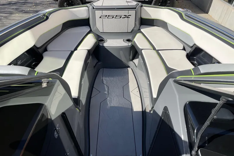 Slide: The Image of 2021 Yamaha Boats 255XD interior with sleek seating and modern design. - 11