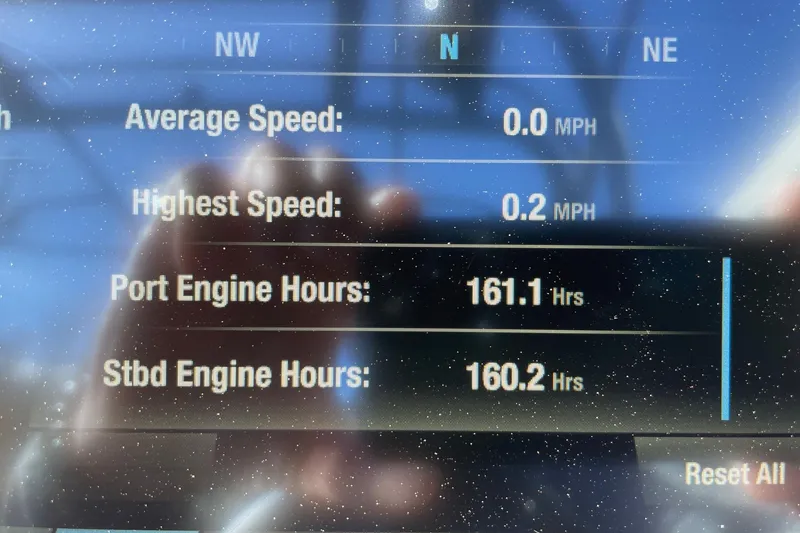 Slide: The Image of Display screen of 2021 Yamaha Boats 255XD showing speed and engine hours. - 13