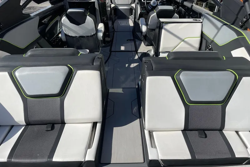 Slide: The Image of 2021 Yamaha Boats 255XD interior with modern seating and sleek design. - 4