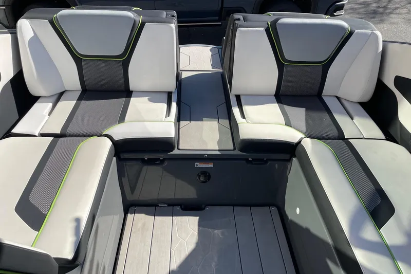 Slide: The Image of 2021 Yamaha Boats 255XD interior seating with modern design and gray accents. - 8