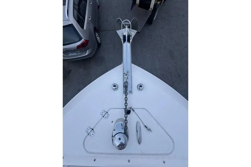 Slide: The Image of Bow view of 2021 Sailfish 245DC boat with anchor and chain mechanism. - 21