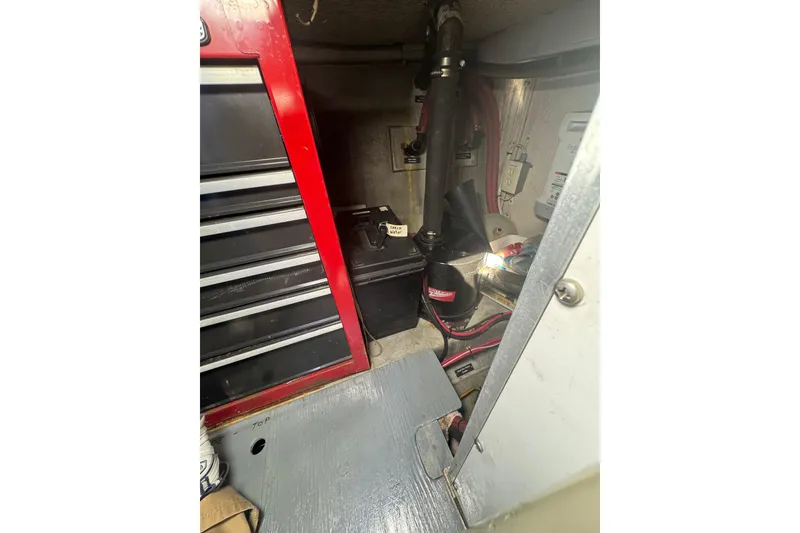 Slide: The Image of Engine room of a 2001 Monk Trawler with tool chest and equipment. - 103