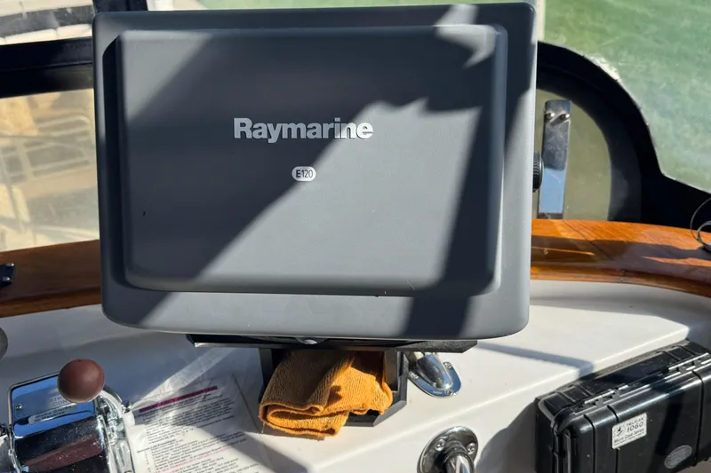 Slide: The Image of Raymarine E120 display on 2001 Monk Trawler boat dashboard. - 18