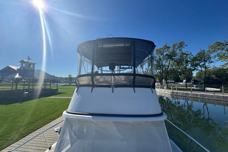 Slide: The Image of 2001 Monk Trawler docked under clear blue sky with sun flare. - 28